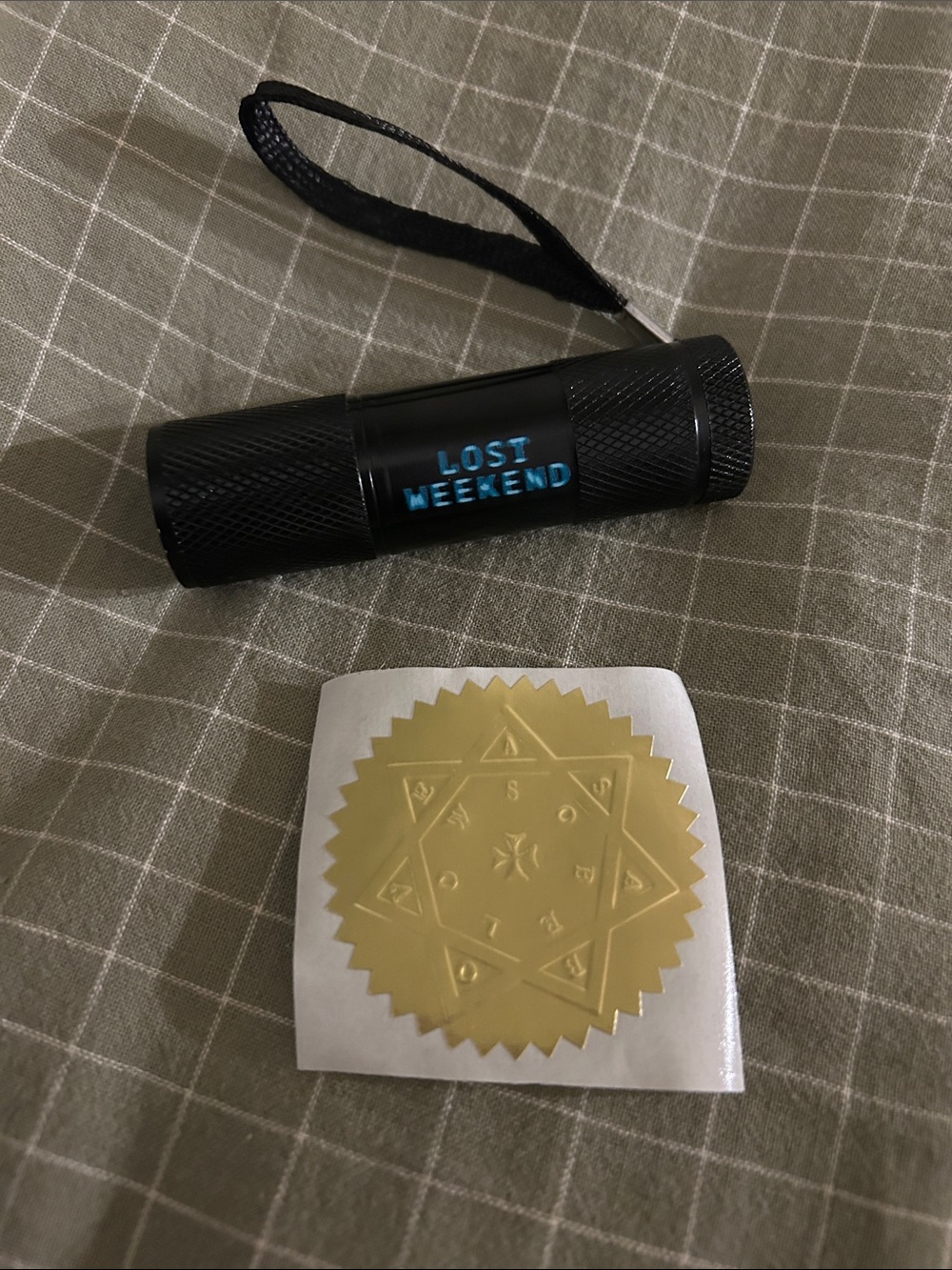 Phoebe Bridgers listening party exclusive blue light and sticker Lost weekend